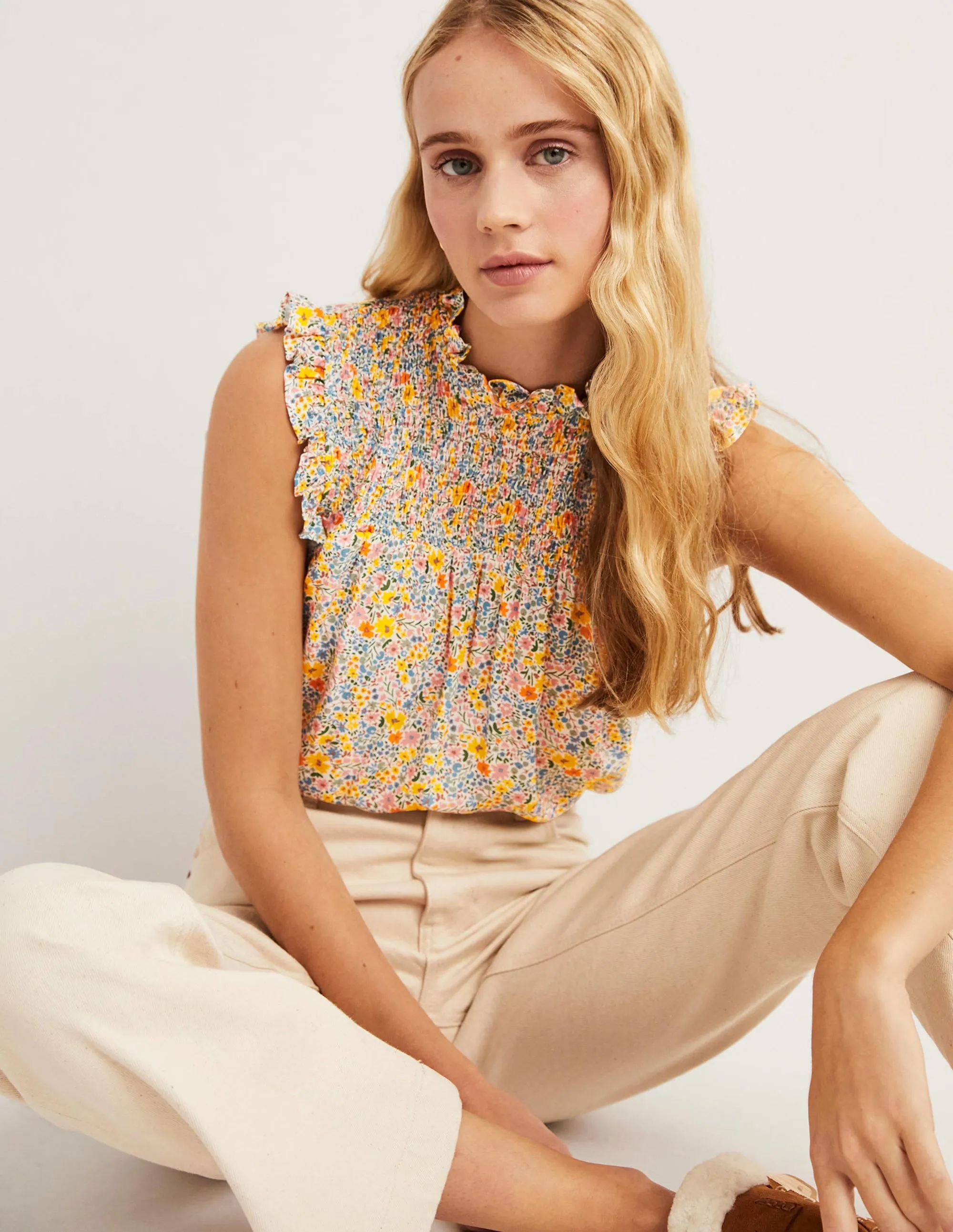 Sleeveless Smocked Top-Ivory. Abstract Ditsy
