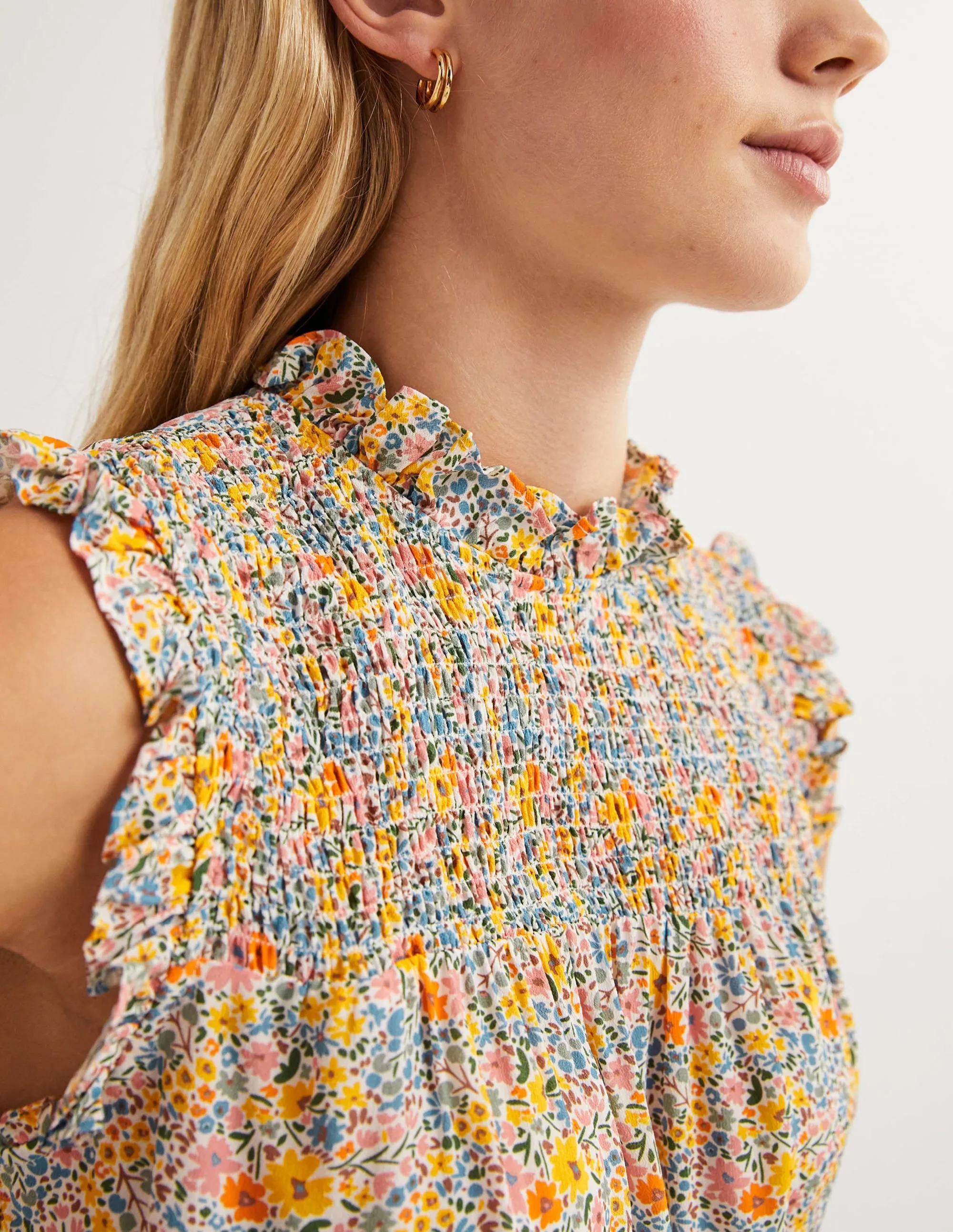 Sleeveless Smocked Top-Ivory. Abstract Ditsy
